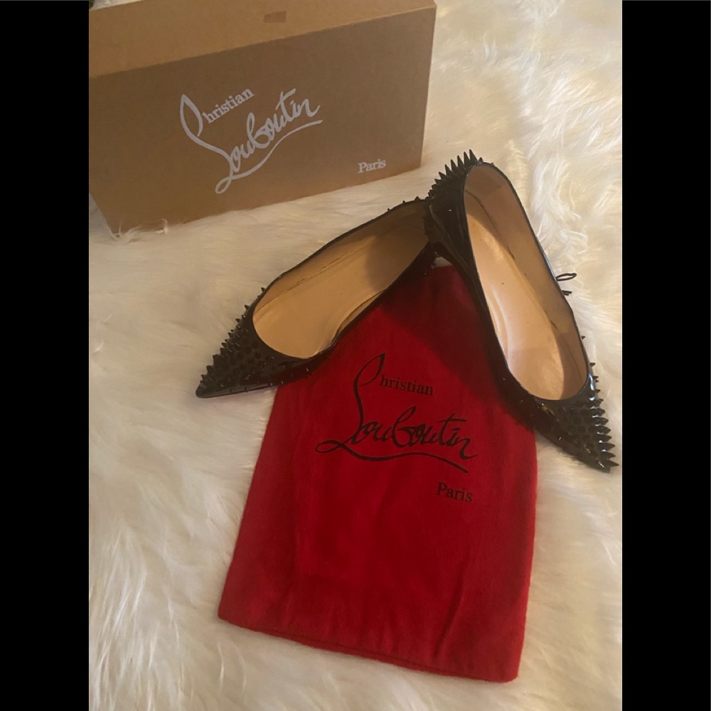 Women Christian Louboutin red bottoms